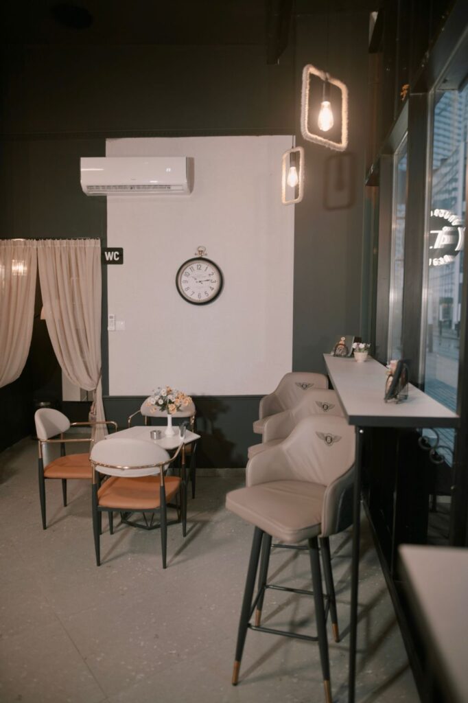 Cozy seating area inside 7 Degrees Lounge in Batumi with modern décor, warm lighting, and a welcoming atmosphere for coffee lovers and shisha enthusiasts.